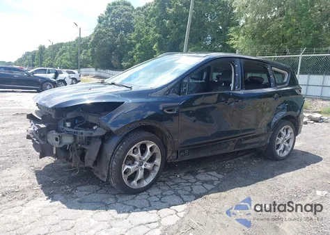 2013 Ford Escape Titanium z USA, uszkodzony, nr VIN 1FMCU0J90DUA13114